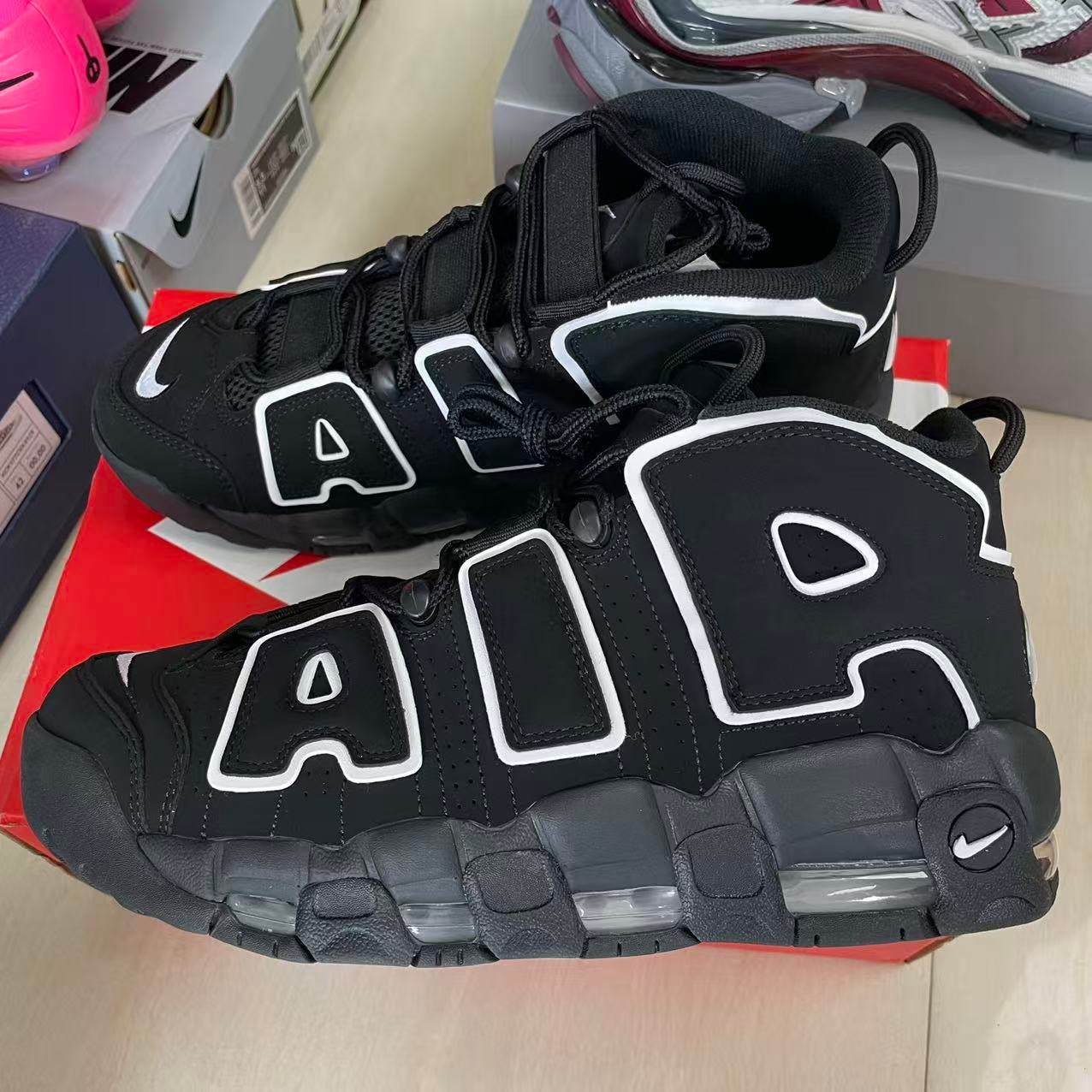 Nike Air More Uptempo black and white sneakers customer delivery proof