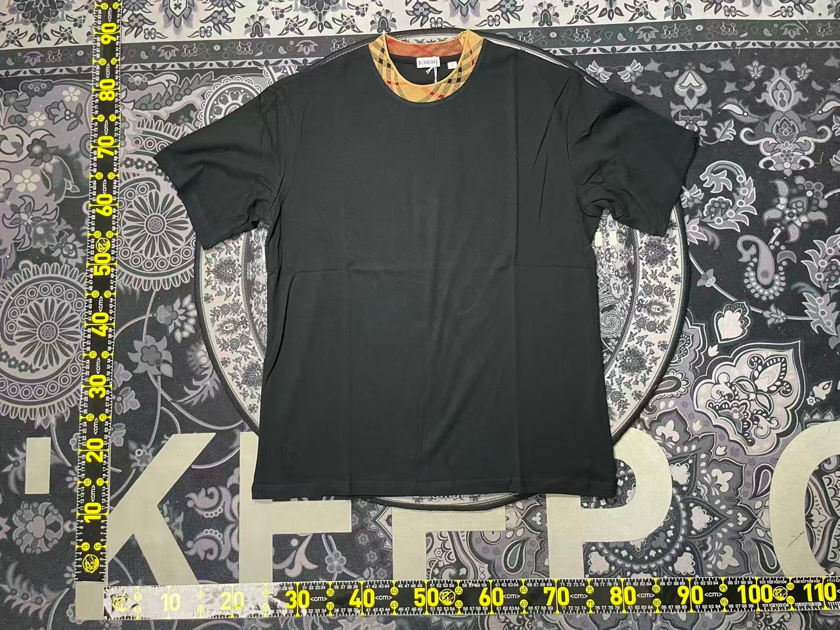 Burberry Black Tee — check collar, packed with dust bag