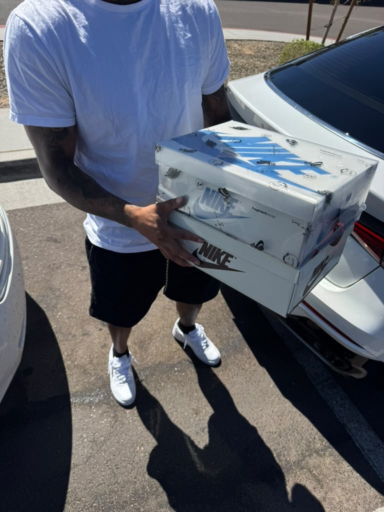 Shrink-wrapped Nike box arriving sealed customer proof