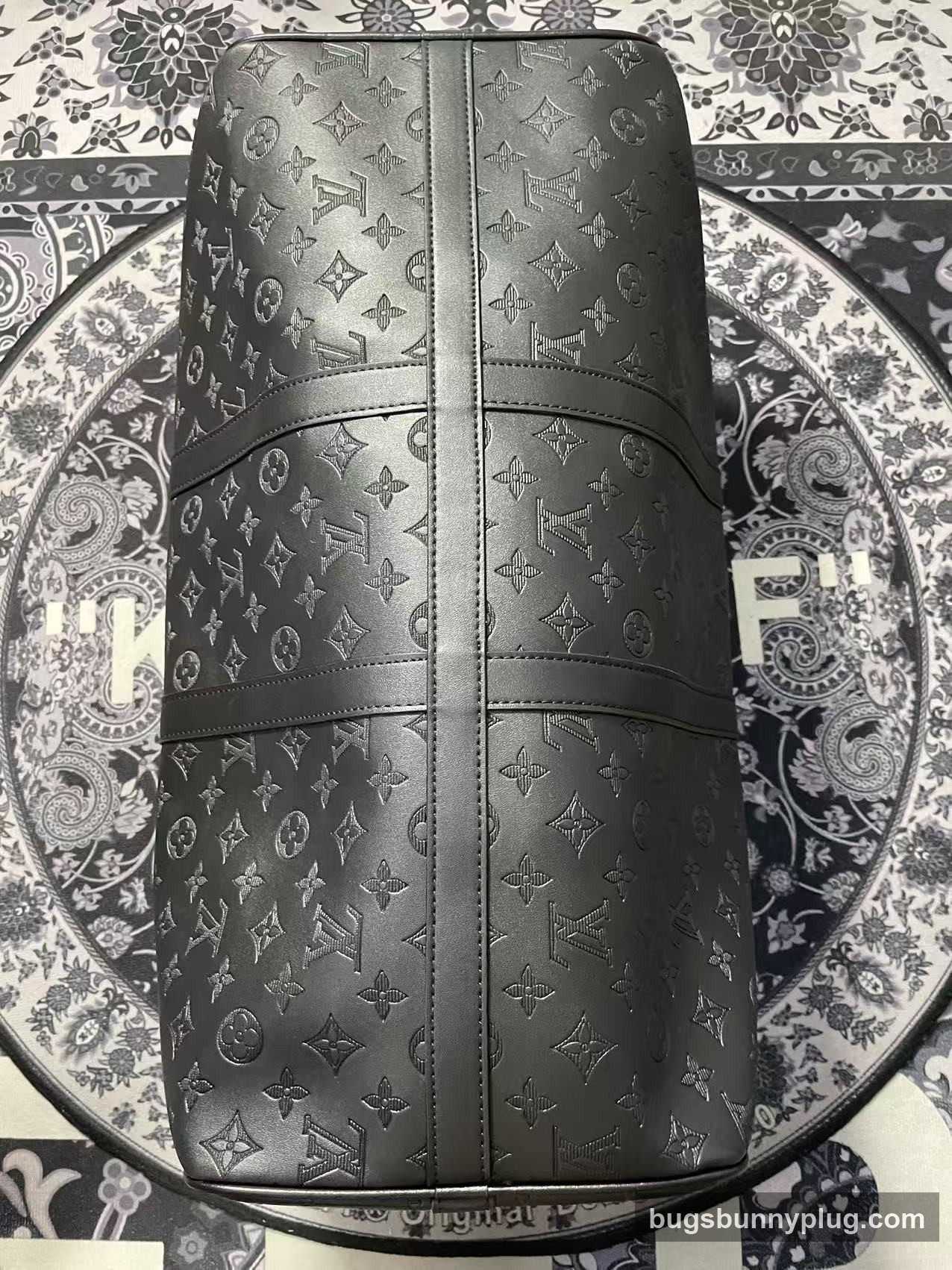 L&V monogram backpack QC photo, monogram leather close-up